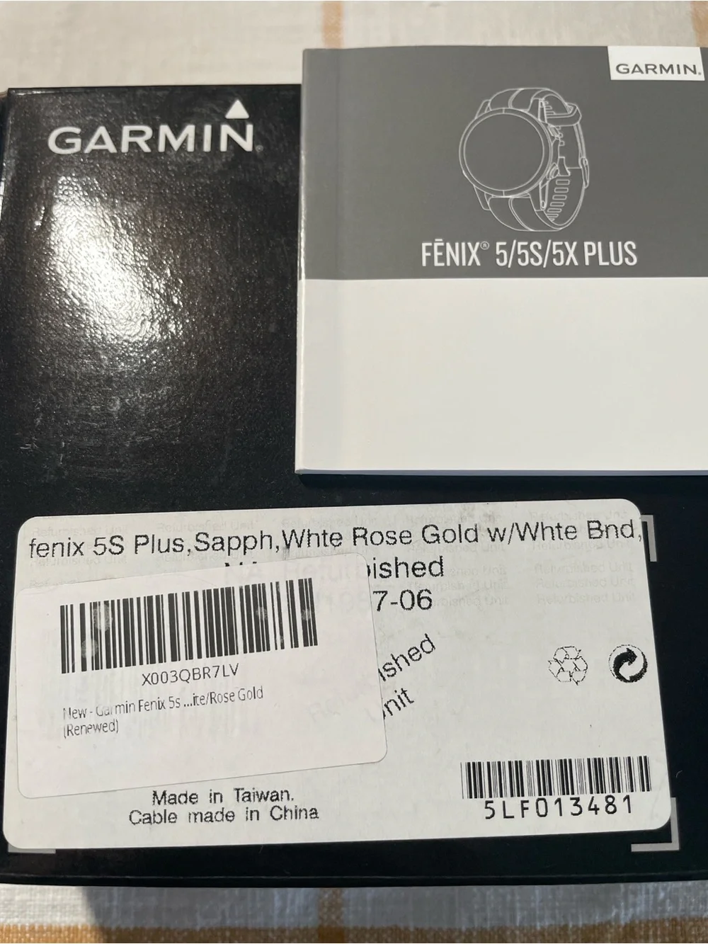 Garmin Fenix 5s Plus smartwatch in white with rose gold bezel
